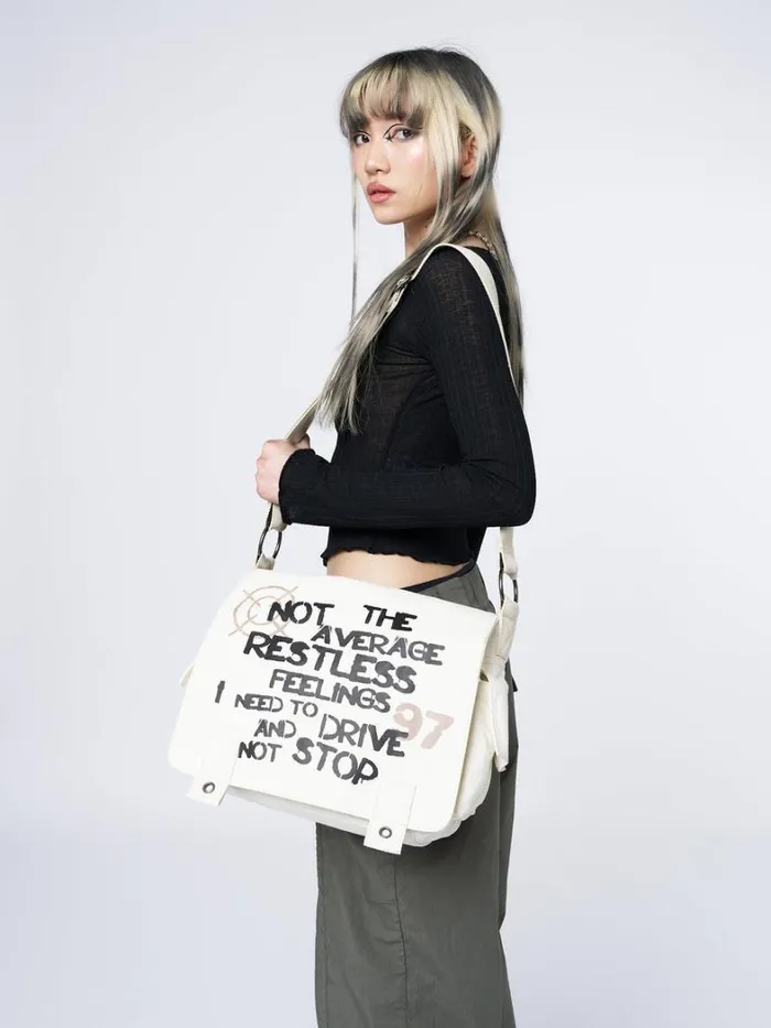 Shop Minga London Accessories Non Stop White Canvas Messenger Bag