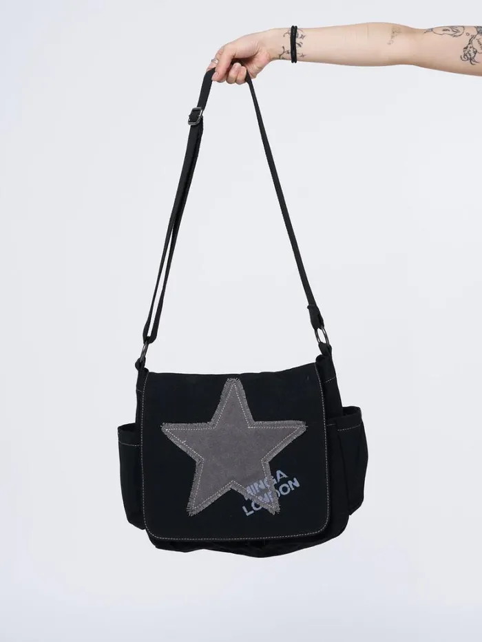 Shop Minga London Accessories Super Star Black Canvas Messenger Bag