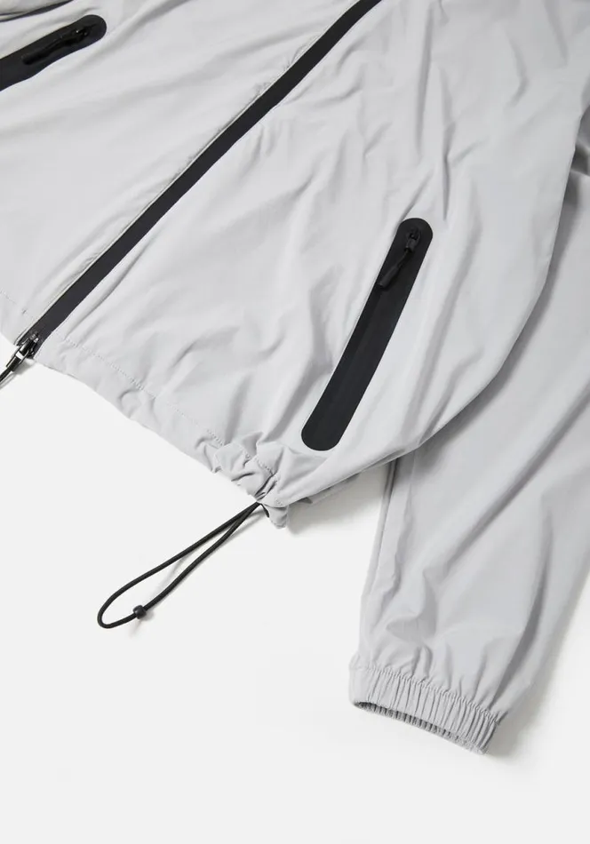 Shop MKI LIGHTWEIGHT SHELL HOODED JACKET Light Grey MKI MIYUKI ZOKU Outerwear