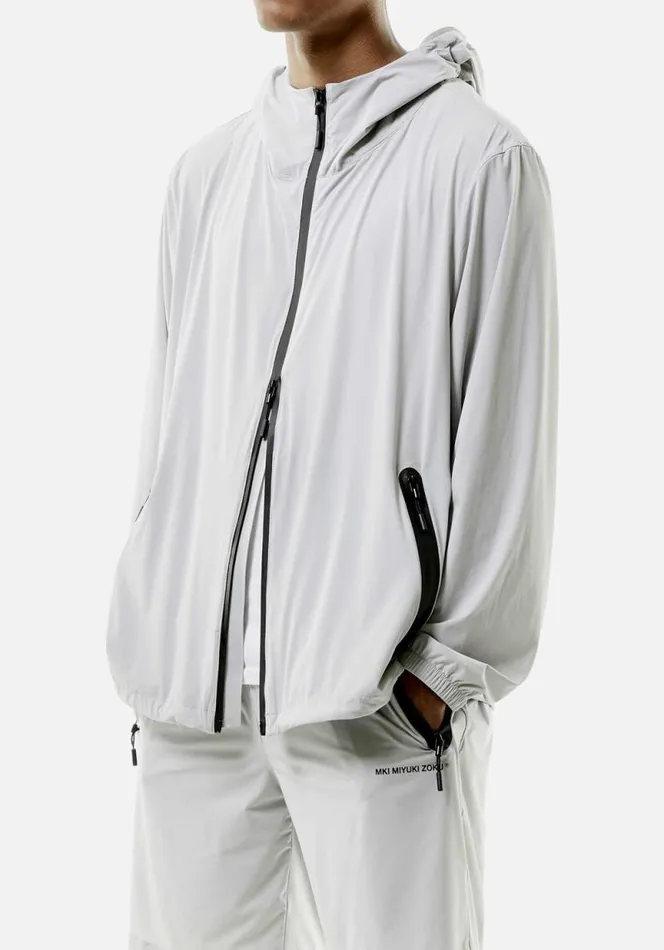 Shop MKI LIGHTWEIGHT SHELL HOODED JACKET Light Grey MKI MIYUKI ZOKU Outerwear