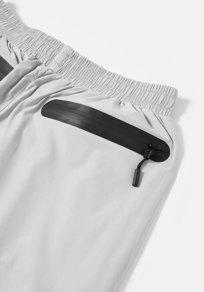 Shop MKI LIGHTWEIGHT SHELL TRACK SHORTS Light Grey MKI MIYUKI ZOKU Shorts