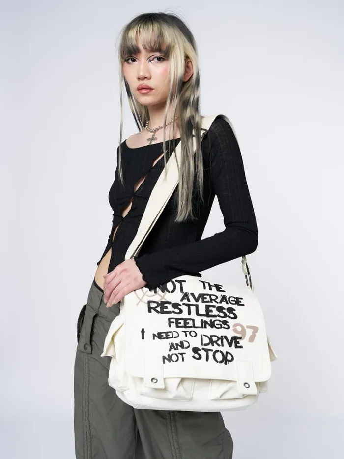 Shop Non Stop White Canvas Messenger Bag Minga London Accessories