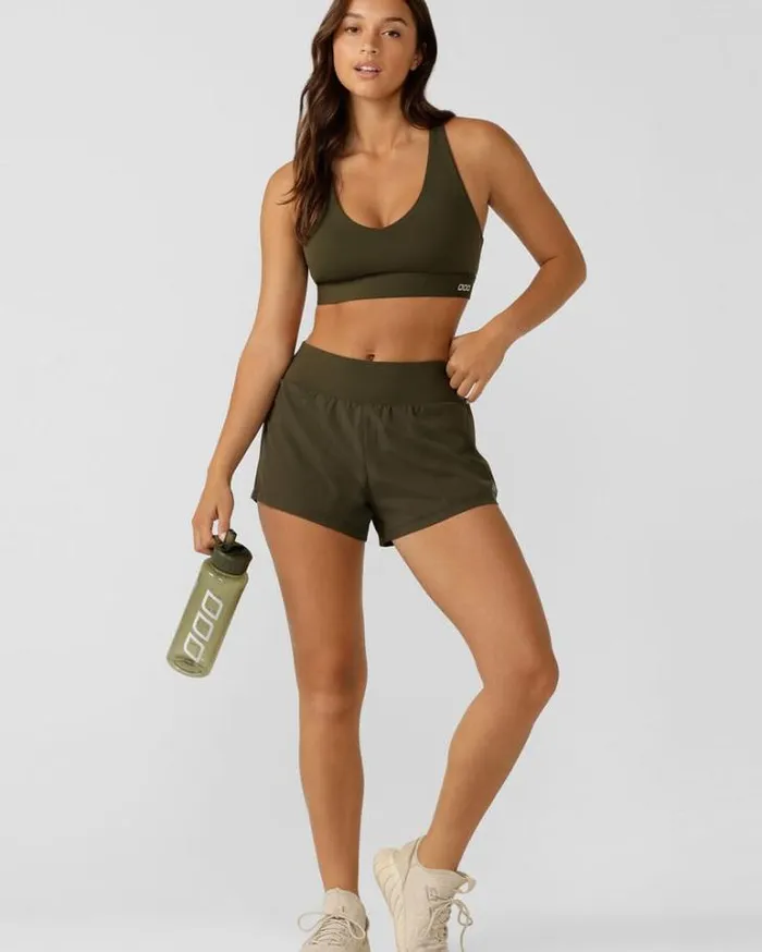 Women LORNA JANE Running Shorts Stretch and Stride Pocket Run Short Luxury Green