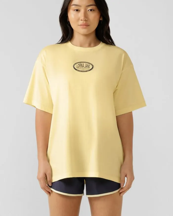 Women LORNA JANE Tops Active Nation Washed Boyfriend Tee Lemon Cream